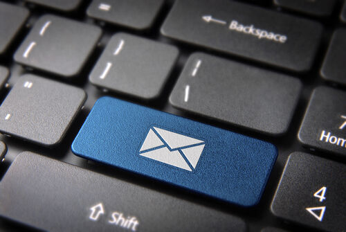 Email is still alive and kicking A photo of a keyboard with one key blue with an envelope