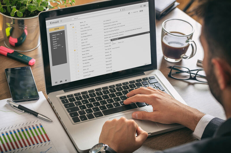 Email discussion lists allow easy discussion by email A man viewing emails on a laptop