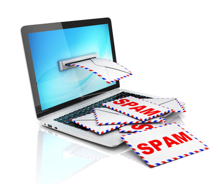 A graphic of spam coming out of a laptop